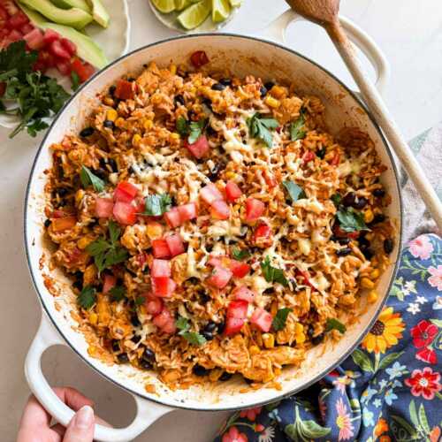overhead view of Mexican chicken and rice in a skillet
