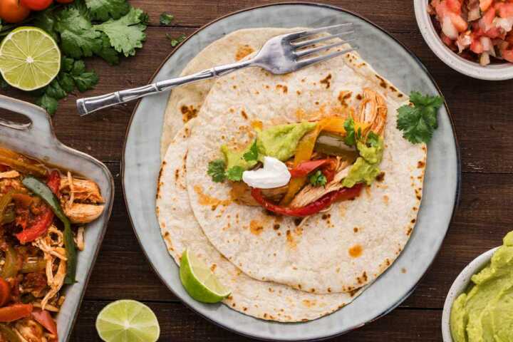 serving chicken fajitas