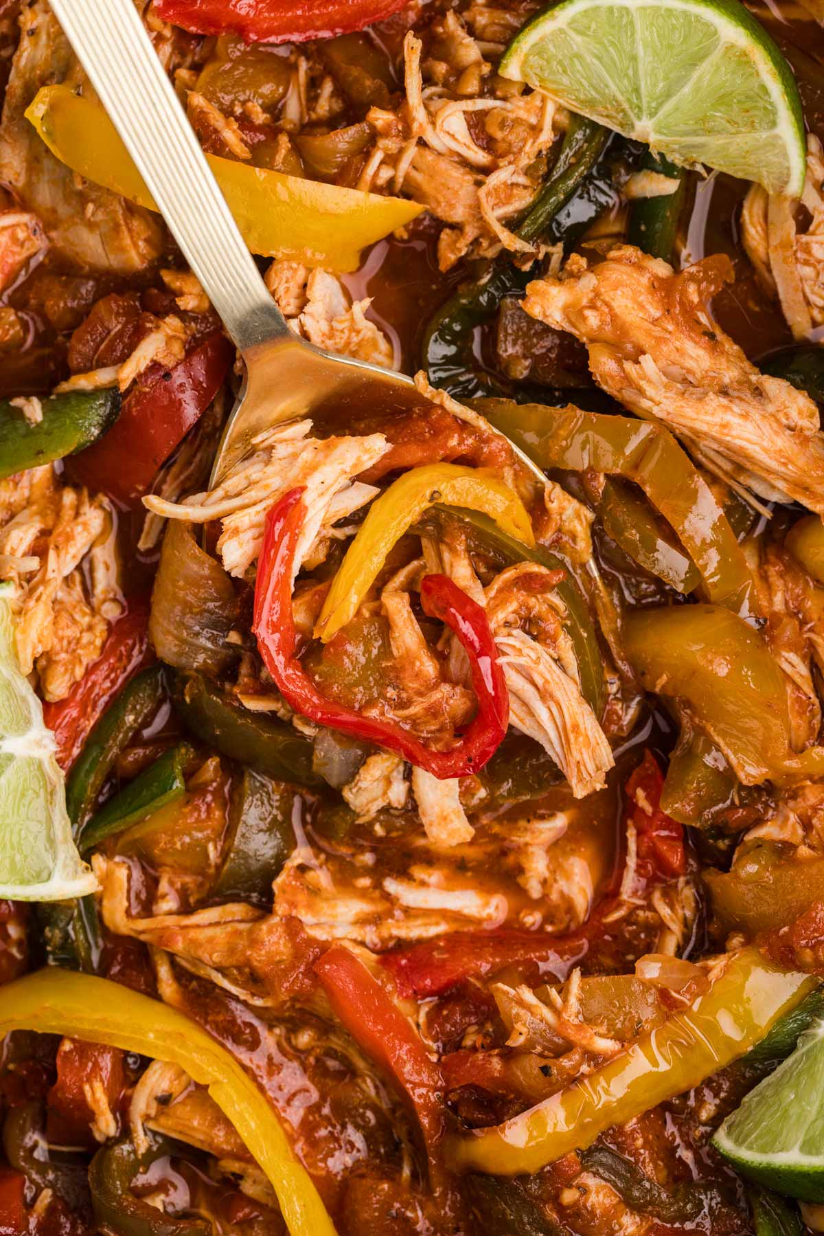 spoon in chicken fajita filling