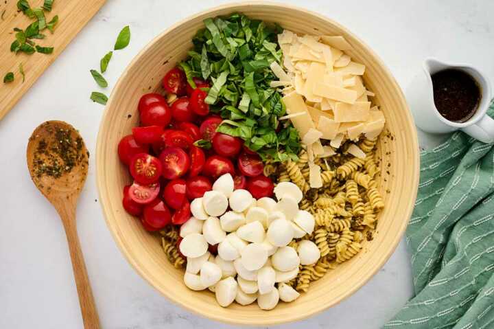 pasta salad being assembled