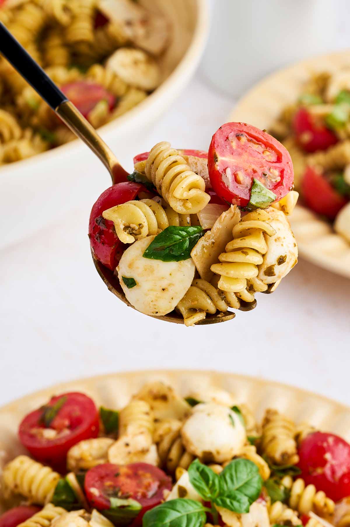 spoonful of caprese pasta salad