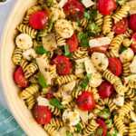 overhead view of pesto pasta salad in a bowl