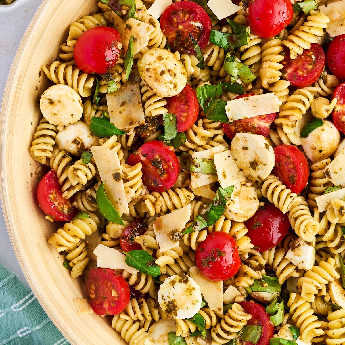 overhead view of pesto pasta salad in a bowl