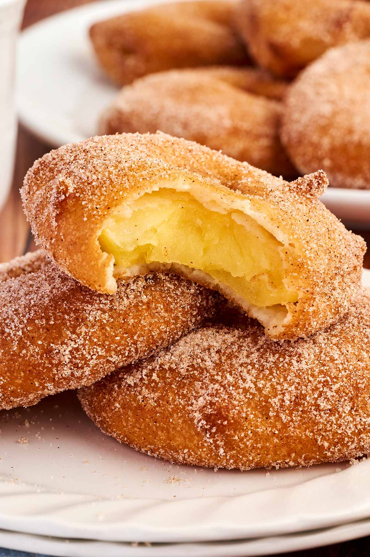 apple fritter being eaten