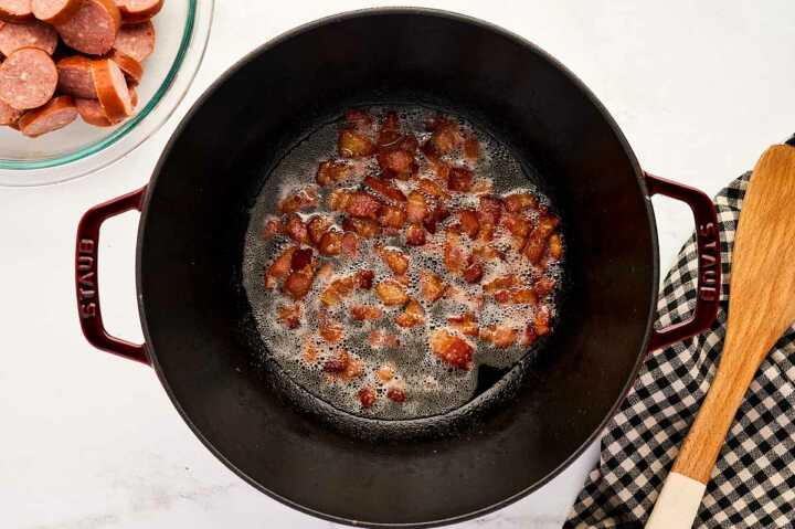 Browning the bacon.