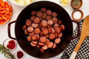 Browning the sausage.