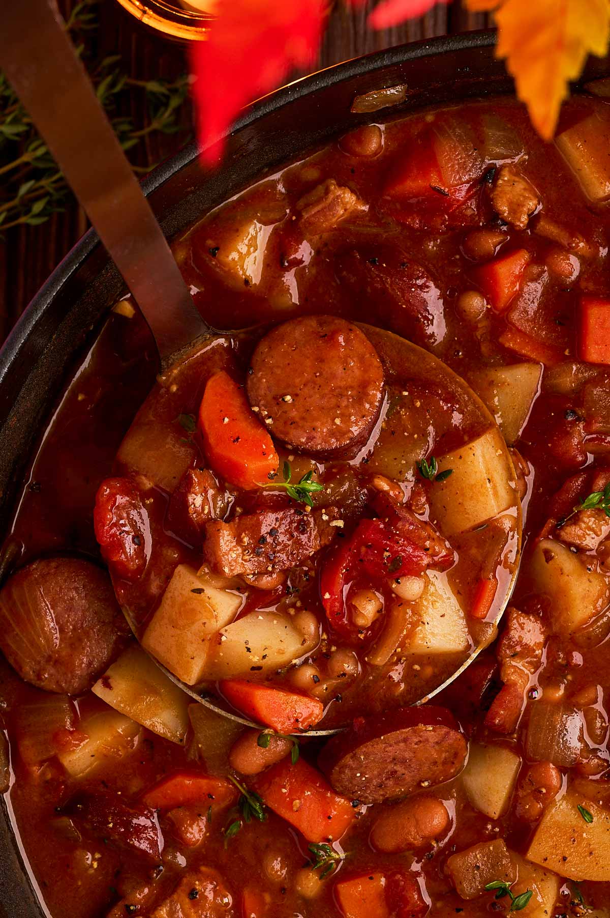 Scooping up bonfire stew.