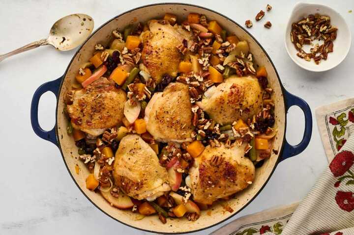 Now the chicken skillet supper is nearly finished, adding pecans and cranberries now.