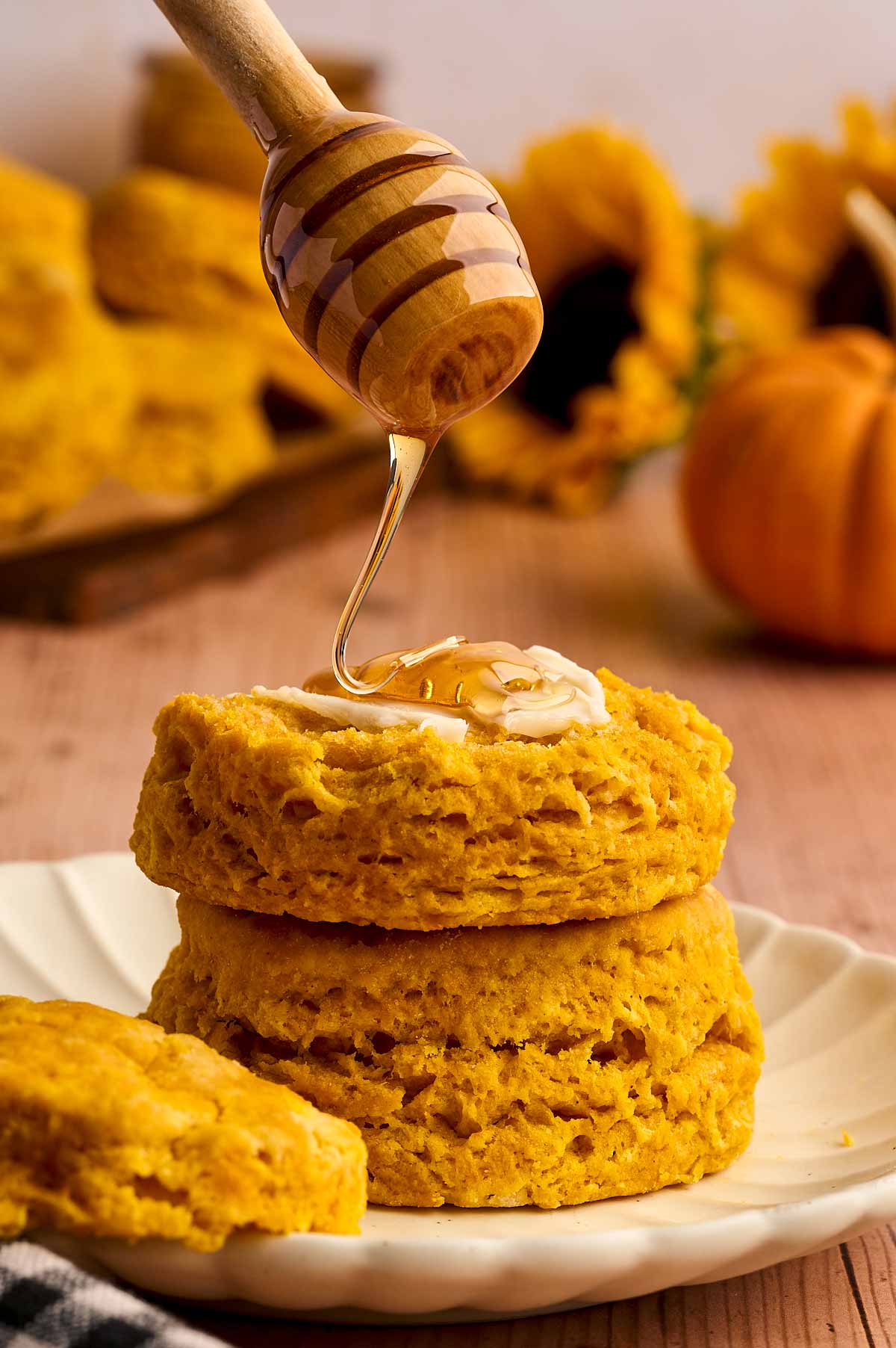 Drizzling honey over pumpkin biscuits is the best!