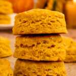 A stack of the flakiest pumpkin biscuits.