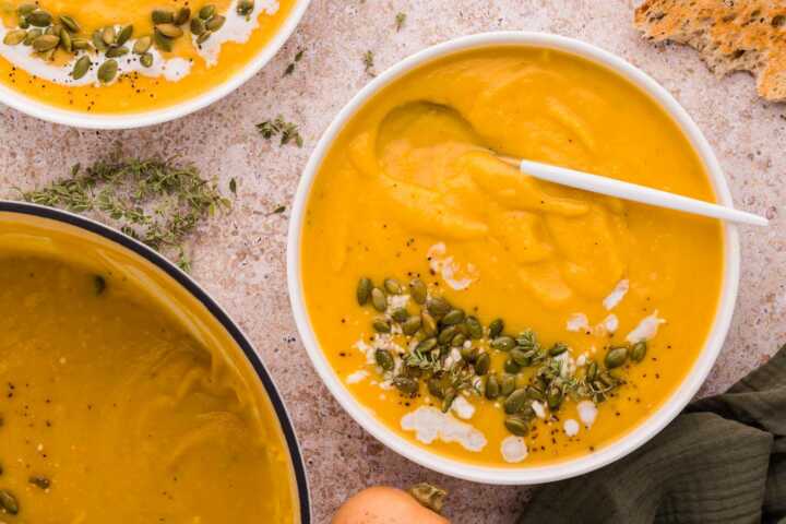 serving butternut squash soup