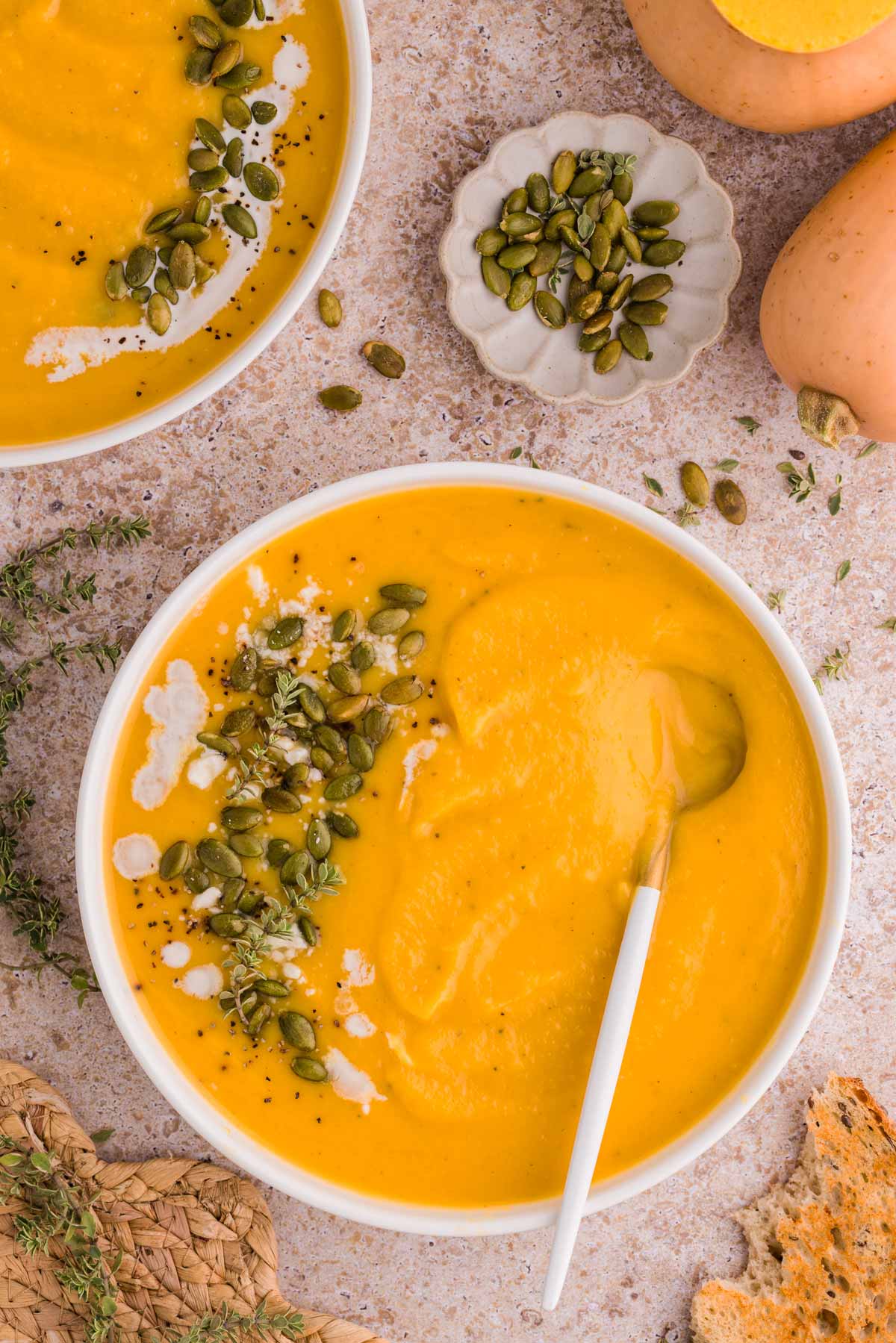 Butternut squash soup in a cozy setting.