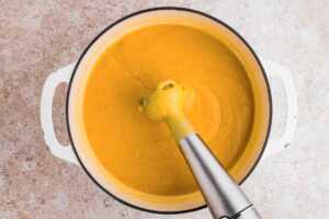 blending butternut squash soup until smooth