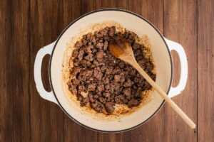 Browning ground beef.