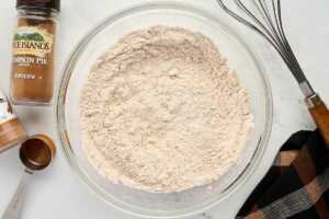 Mixing the dry ingredients for pumpkin bread.