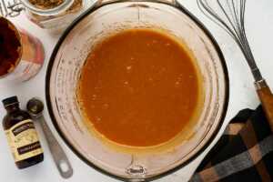 Mixing the wet ingredients for pumpkin bread.