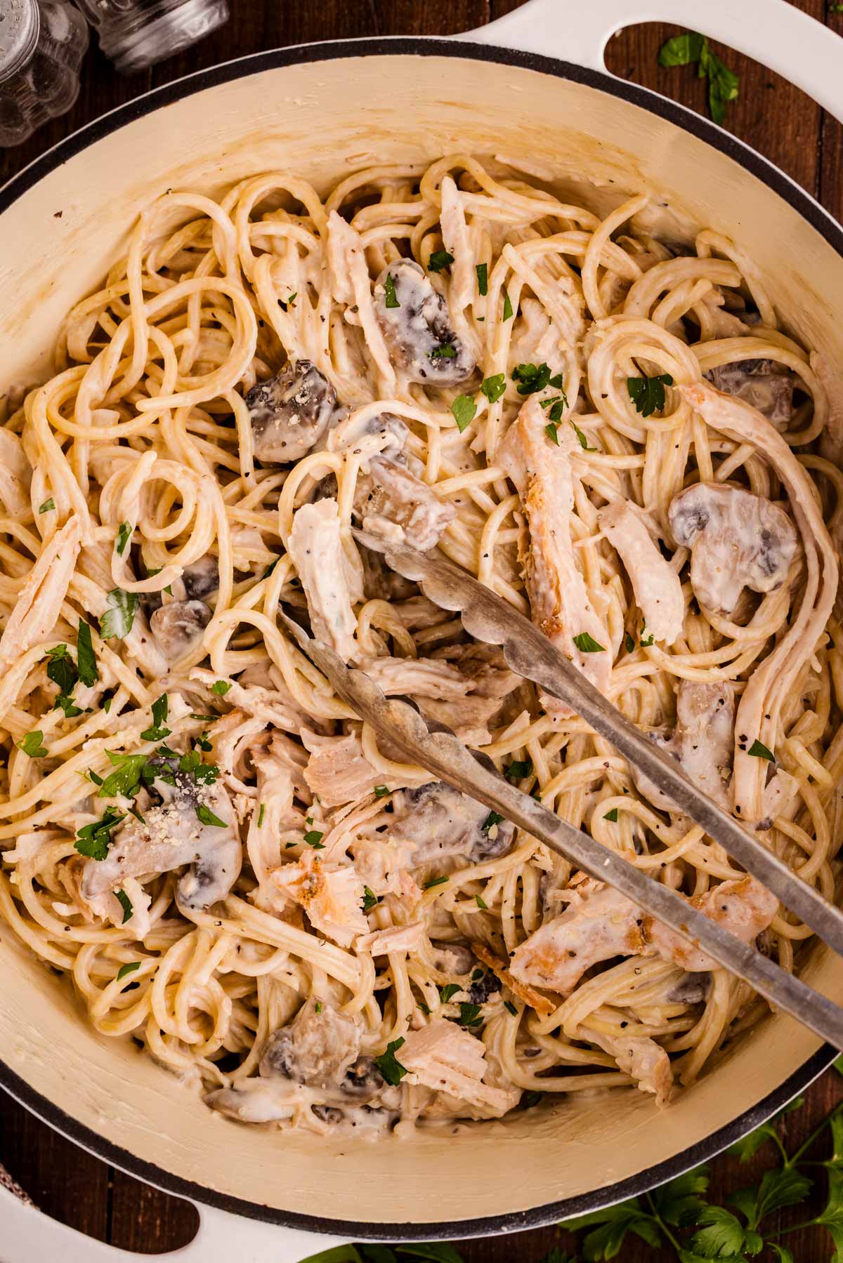 serving a pot of turkey tetrazzini