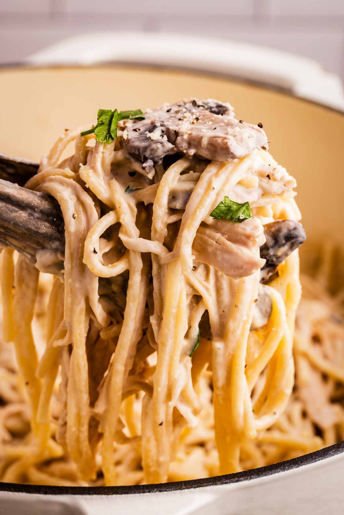 using tongs to serve turkey tetrazzini