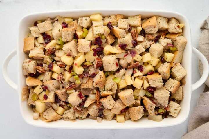 dressing assembled in casserole dish before baking