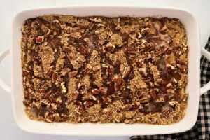 assembled cinnamon pecan coffee cake with butter drizzle before baking
