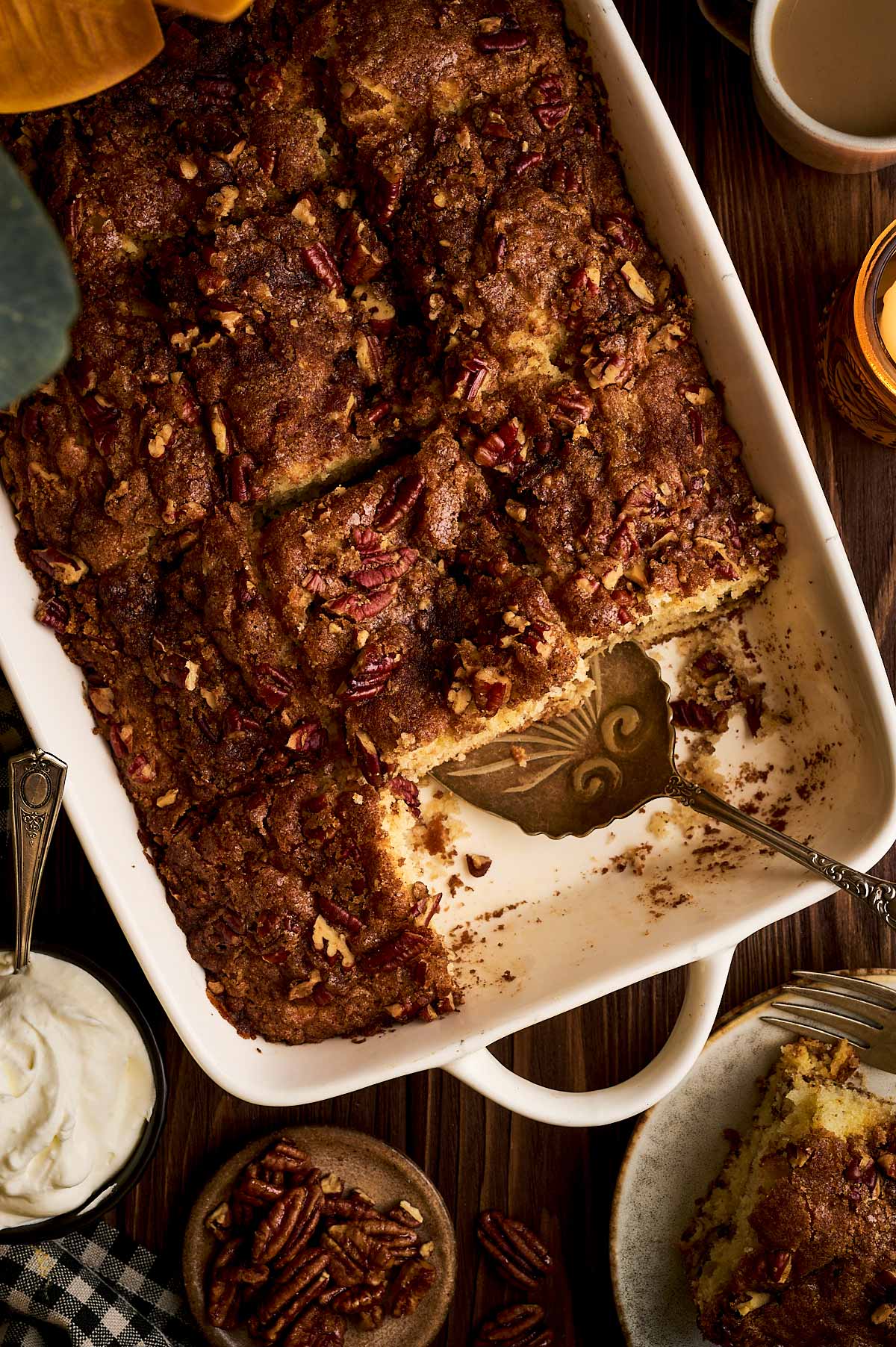 serving cinnamon pecan coffee cake from the pan