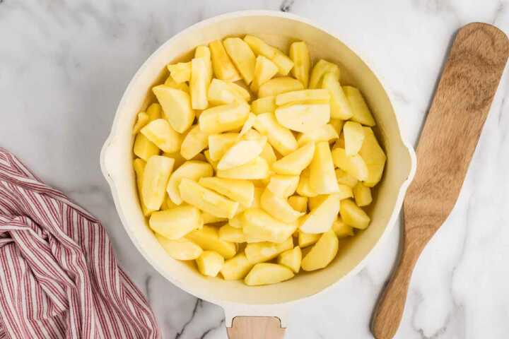 cooking sliced apples in butter