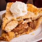 slice of apple pie on a plate