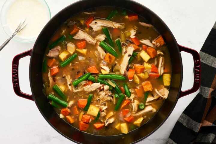 simmering stew made from thanksgiving leftovers