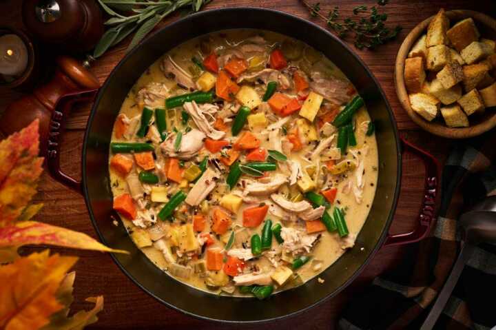 serving a pot of stew made with thanksgiving leftovers