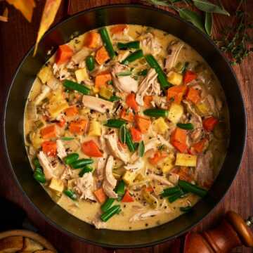 serving a pot of stew made with thanksgiving leftovers