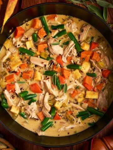 serving a pot of stew made with thanksgiving leftovers
