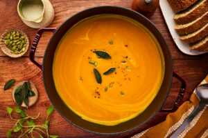 serving pumpkin soup
