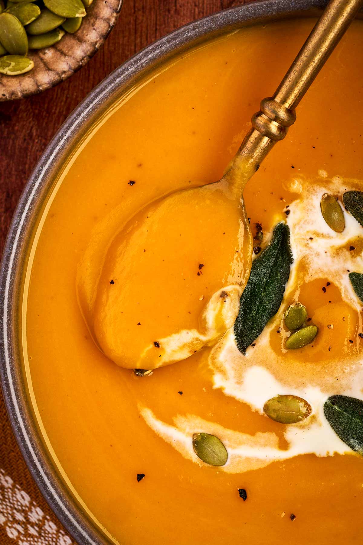 eating creamy pumpkin soup