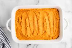 sweet potato casserole filling in baking dish