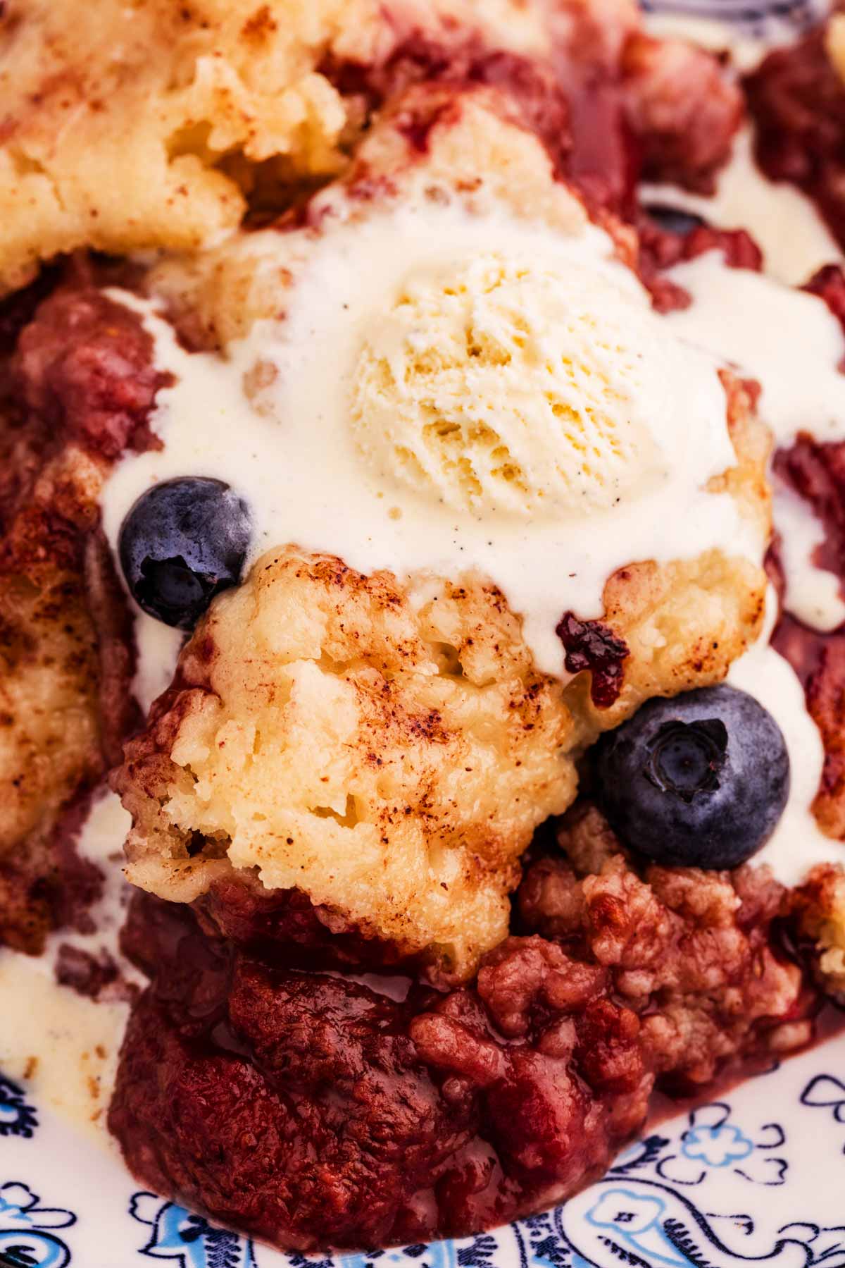 ice cream melting into berry cobbler