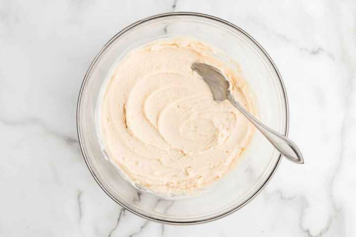 biscuit topping for cobbler being stirred