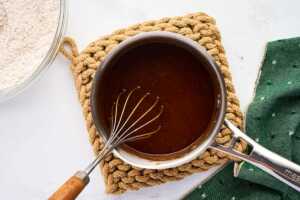 melting butter and molasses with brown sugar