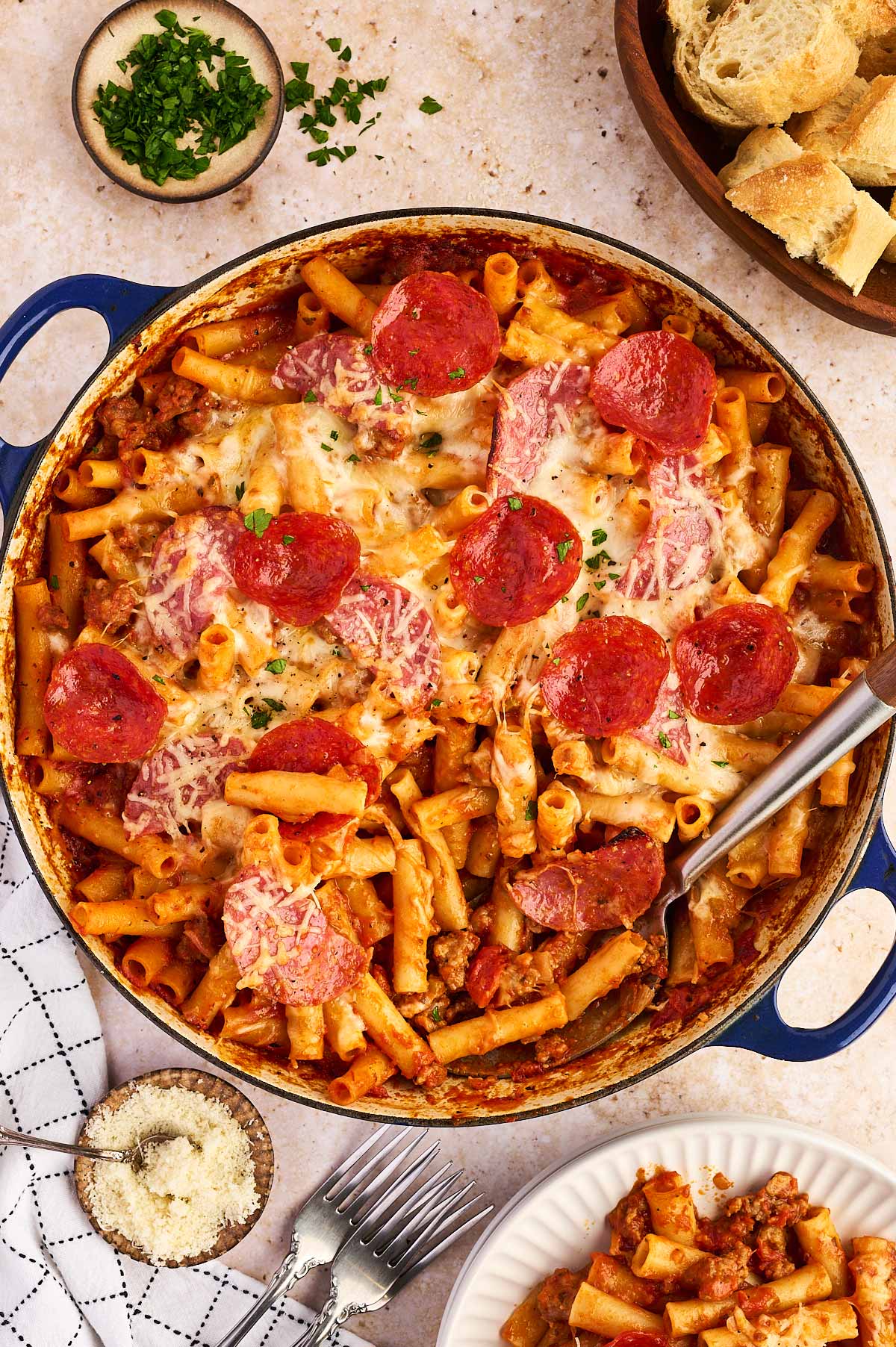serving up a dish full of pizza baked ziti
