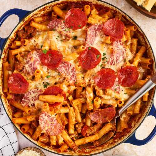 serving up a dish full of pizza baked ziti