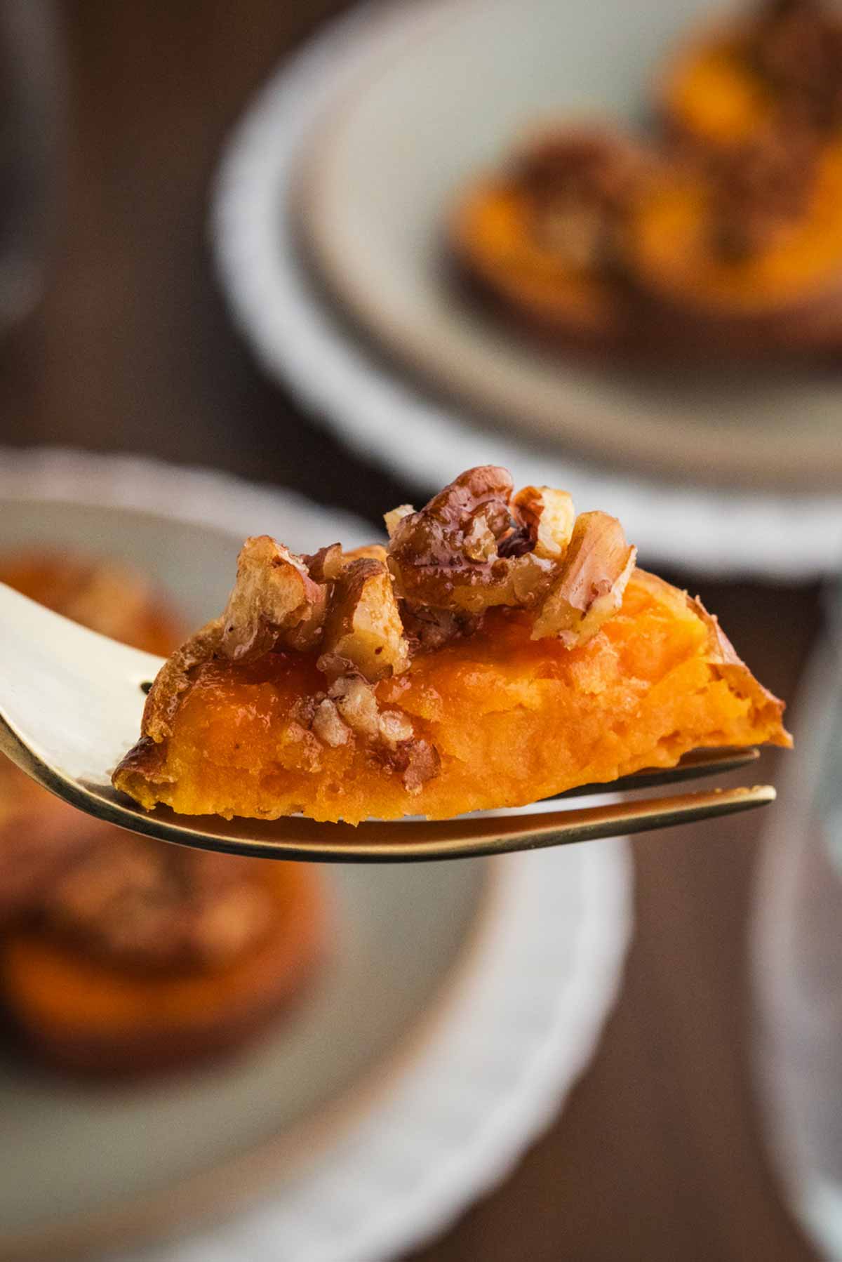 eating a roasted sweet potato slice