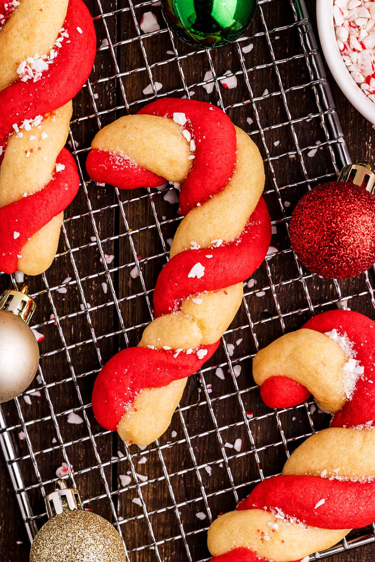 cooling candy cane cookies on a wire rack
