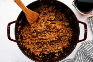 roasting tomato paste with ground beef and vegetables