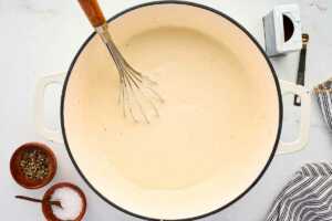 whisking béchamel with ricotta