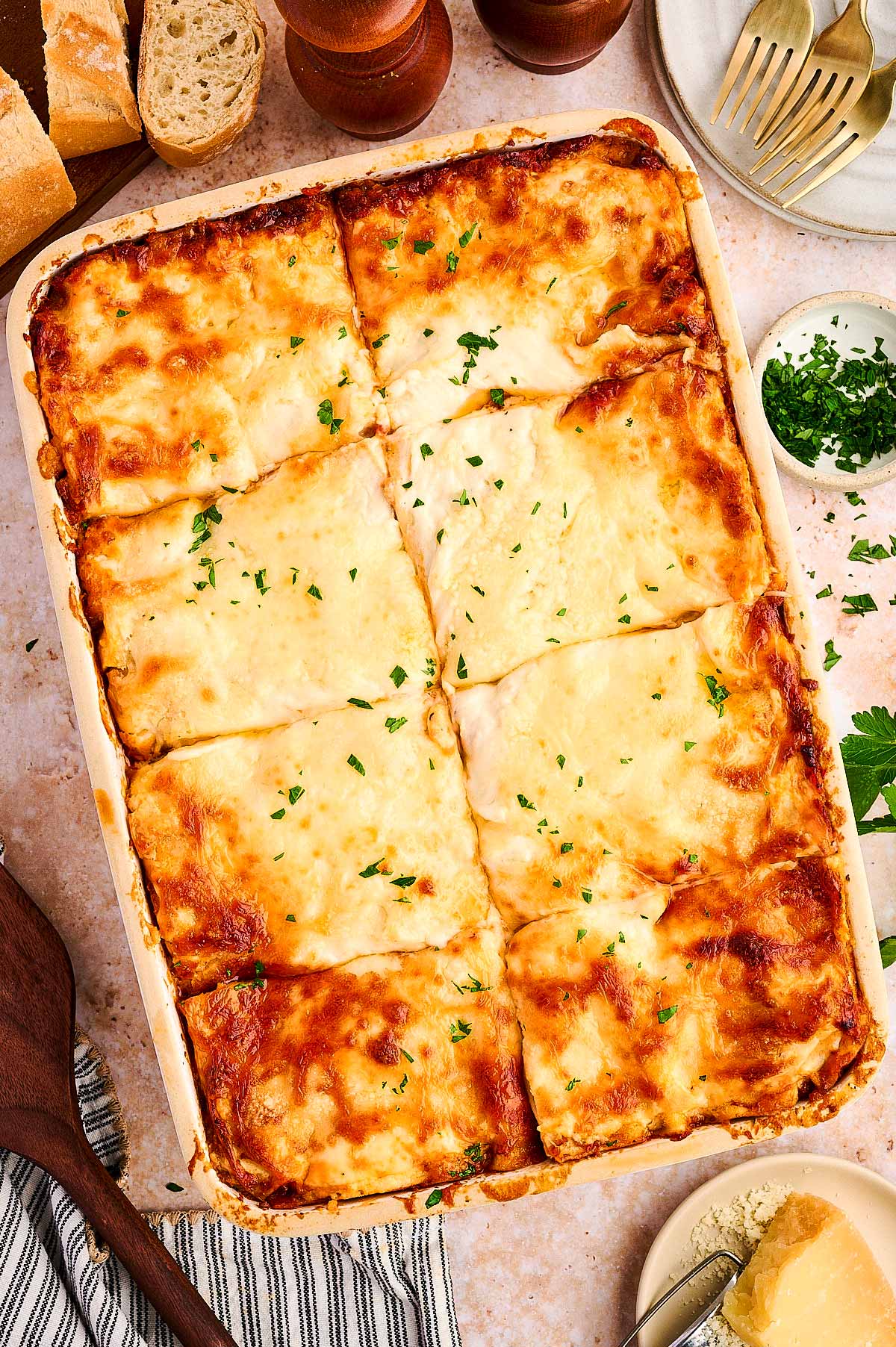 lasagna being served in the casserole dish