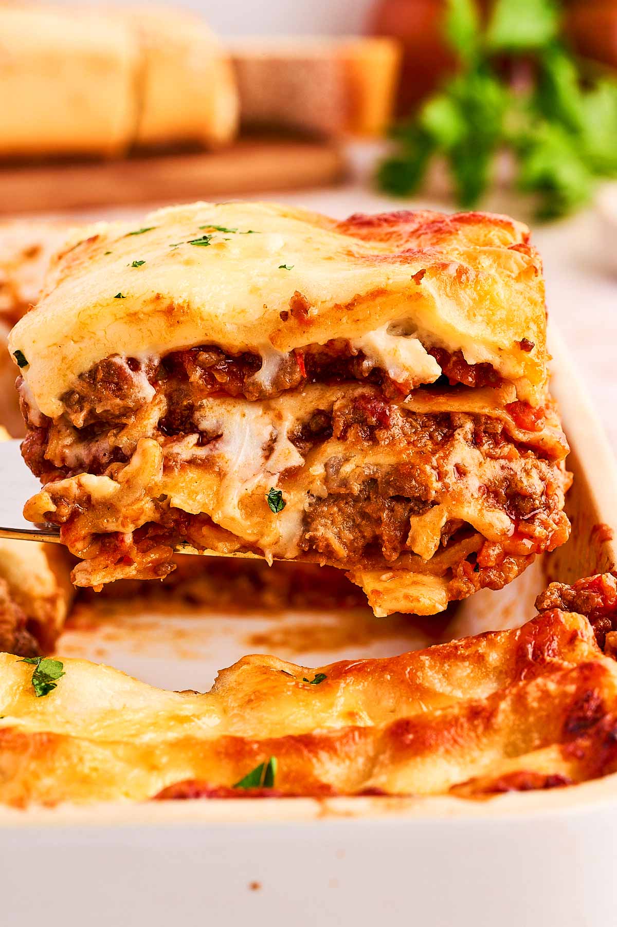 serving a slice of lasagna