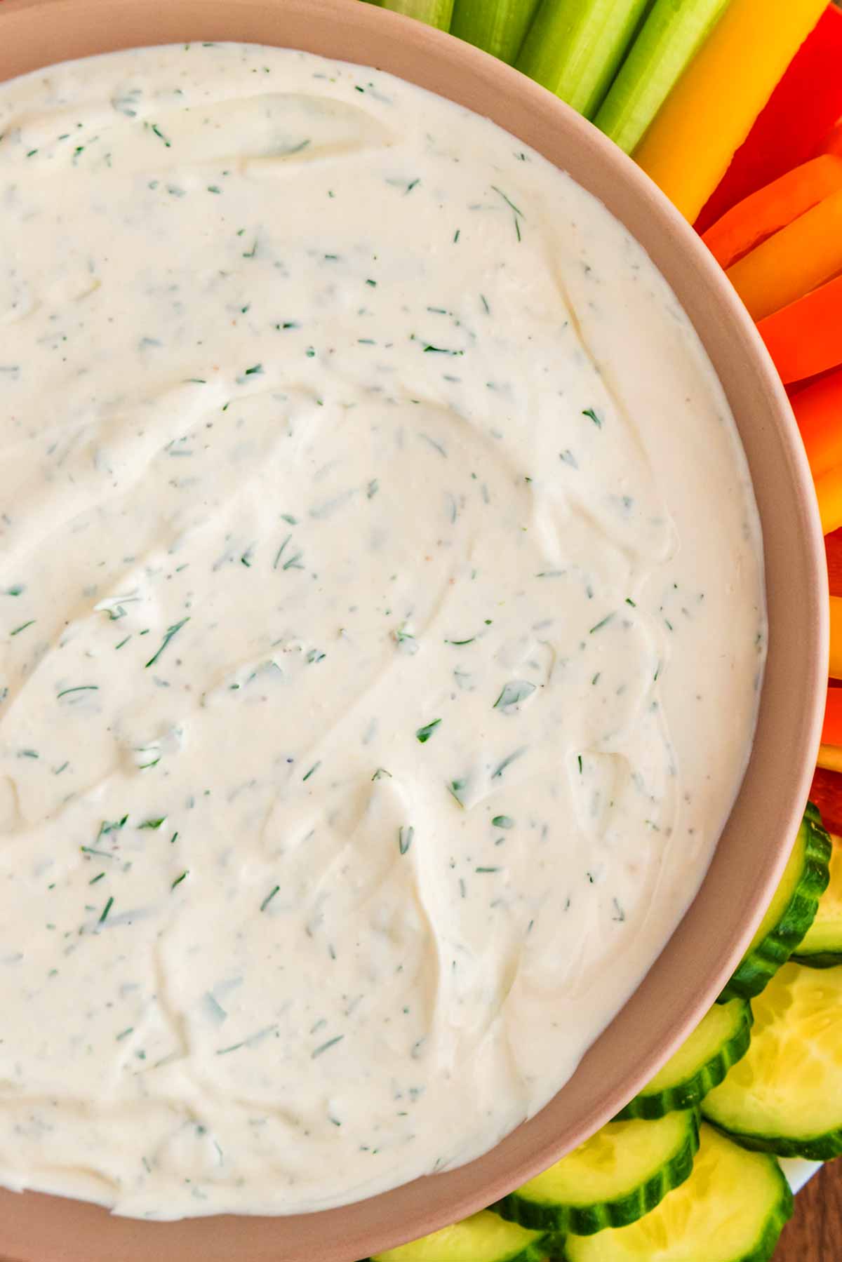 A bowl filled with creamy dill dip.