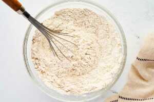 whisking dry ingredients for snickerdoodle cookies