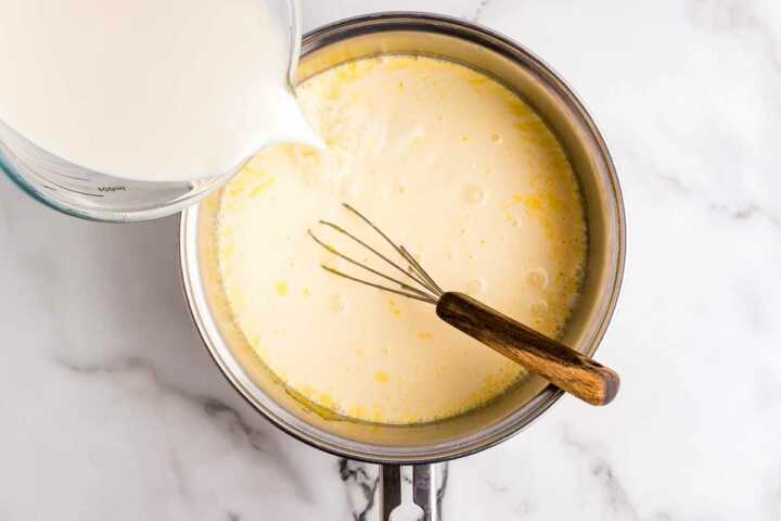 adding milk to eggnog