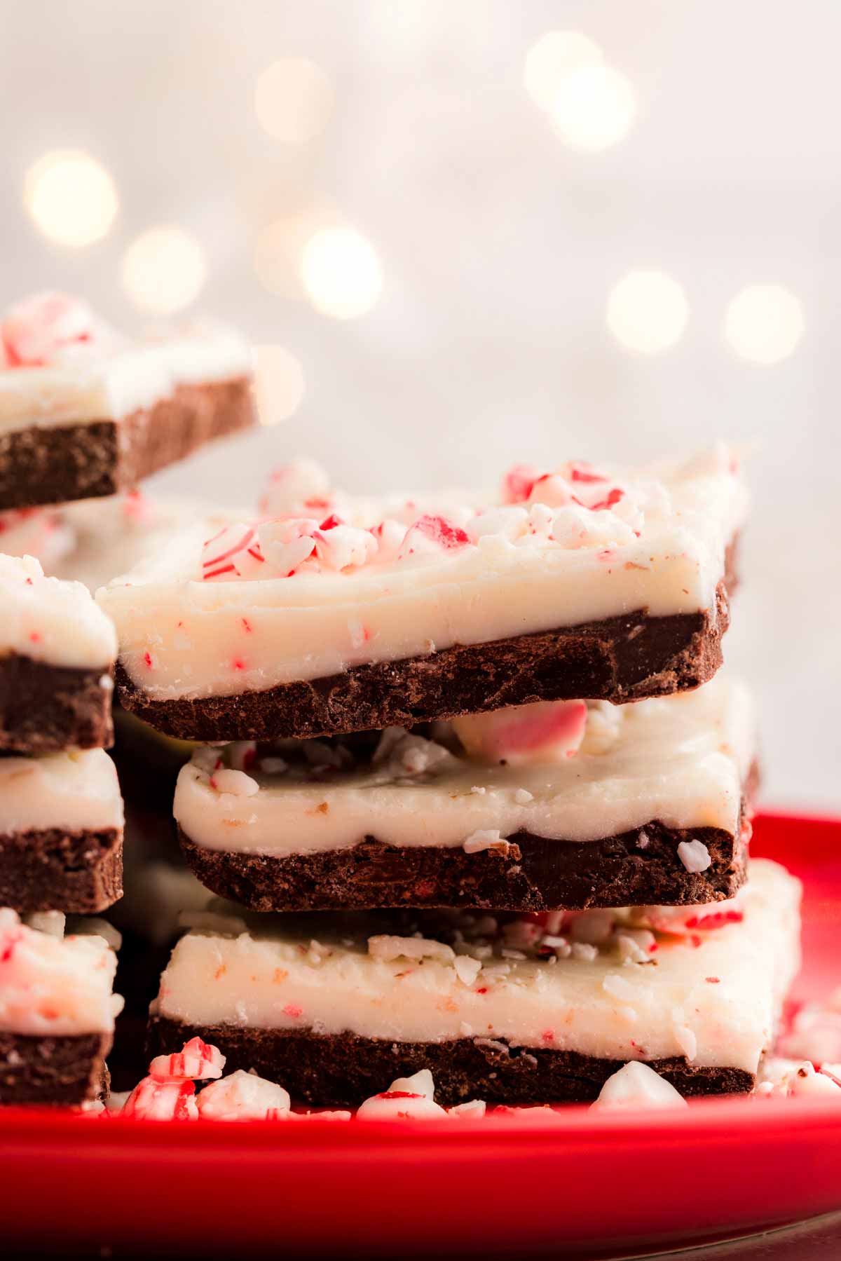 stacking peppermint bark on a plate