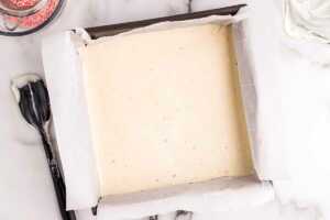 assembling the white chocolate layer for peppermint bark